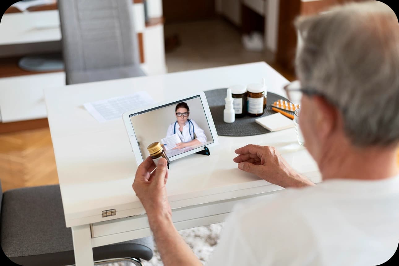 Individual having a virtual consultation with a healthcare provider from home